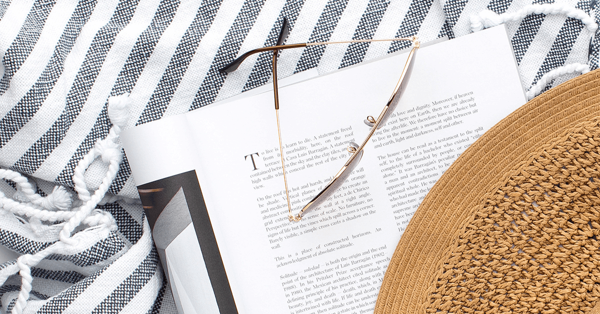 book and a brown hat